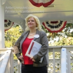 Amber Love as Leslie Knope