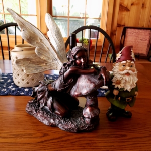 fairy and gnome on table