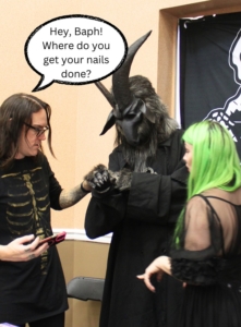 Michael and Jessica from The Grimm Life Collective talking to Baphomet cosplayer