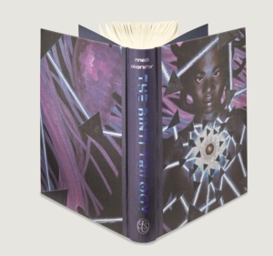 The Binti Trilogy collection shown in hardcover as one book from the Folio Society; book is standing up to show the metallic blue letters of the spine and the art for the back and front covers.